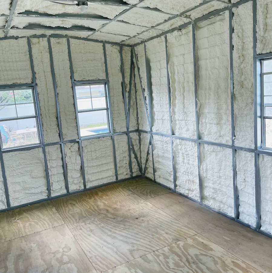 Closed-cell spray foam insulation applied to wall cavities in a residential project in Cary